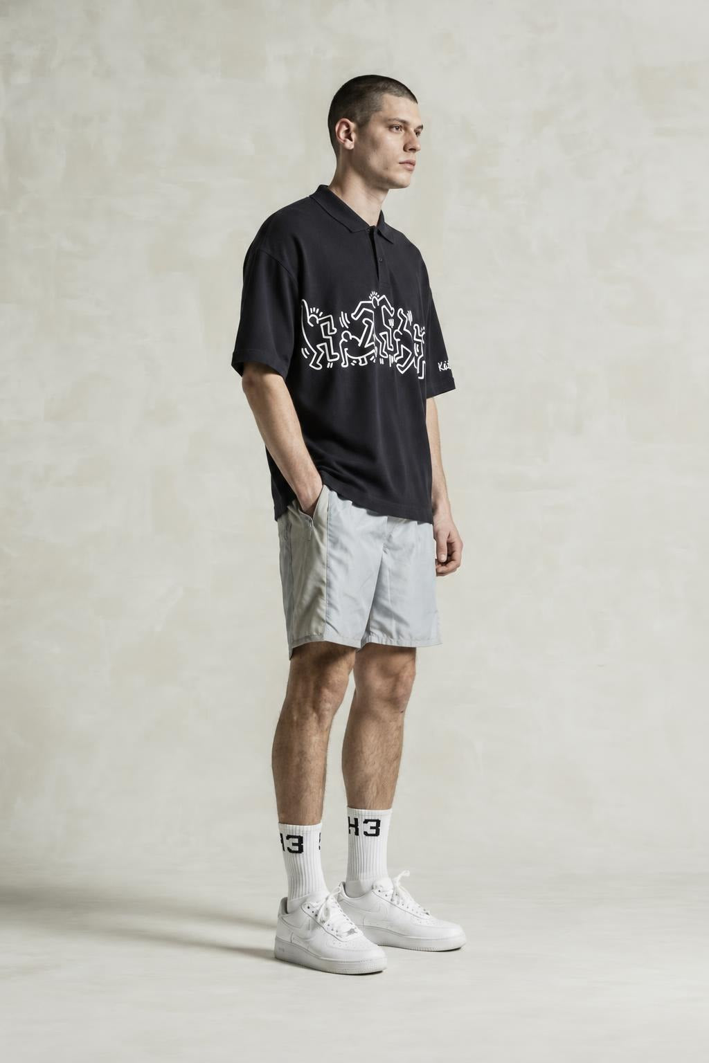 AI model photo - H&M Men's Keith Haring Printed Relaxed Fit Polo T-Shirt Black 1047104 001 H3