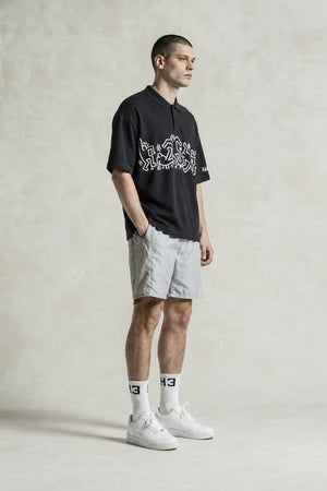 AI model photo - H&M Men's Keith Haring Printed Relaxed Fit Polo T-Shirt Black 1047104 001 H3