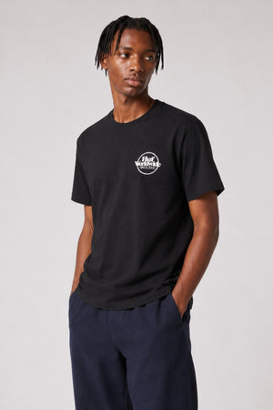 AI model photo - HUF Issues Logo Puff Short Sleeve Tee Black TS01161