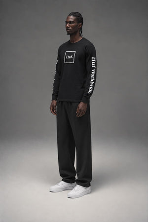 AI model photo - HUF Essentials Domestic L/S Tee Black TS00146