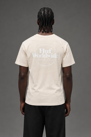 AI model photo - HUF Issues Logo Puff Short Sleeve Tee Unbleached TS01161