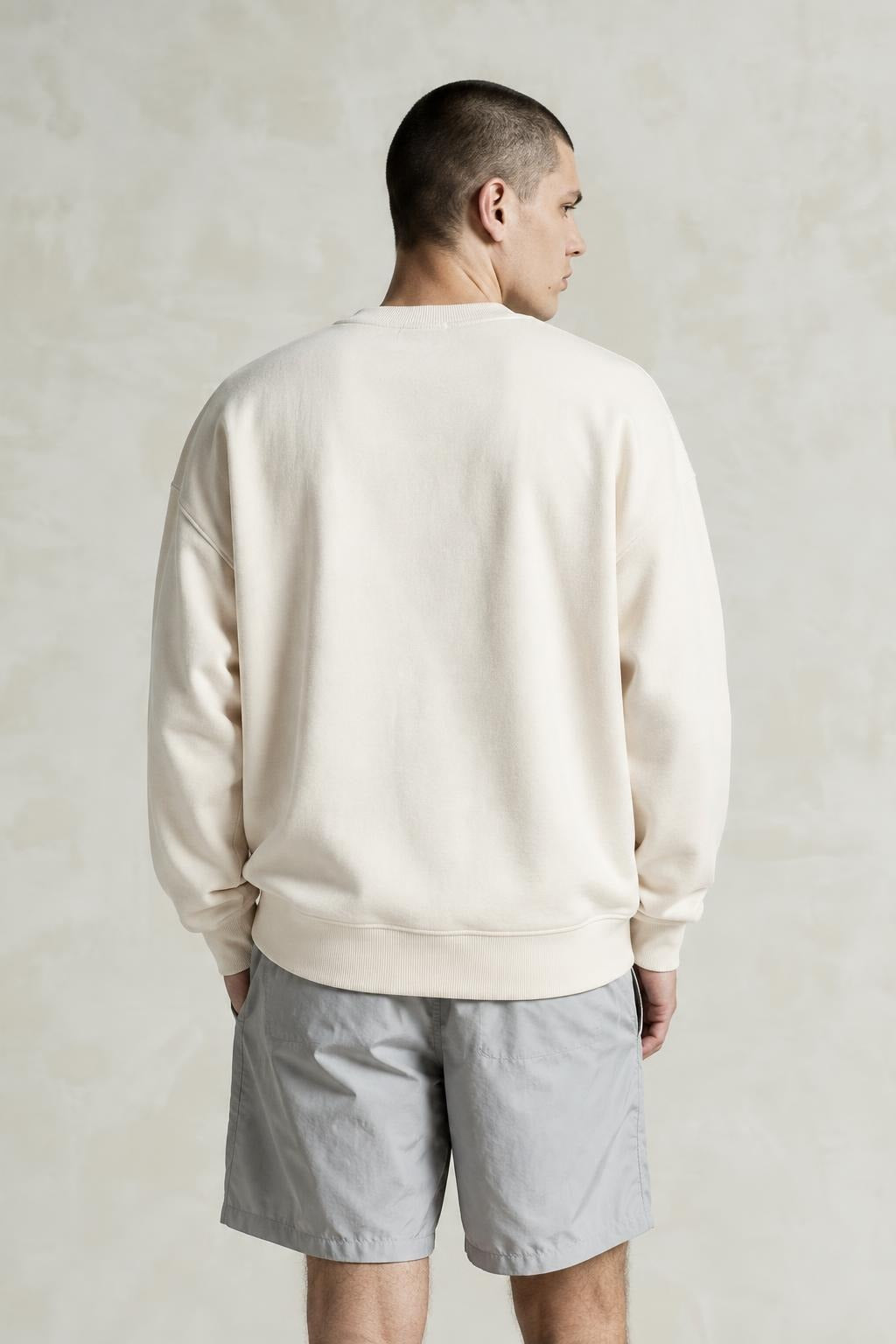 AI model photo - H&M Men's Relaxed Fit Smiley Printed Sweatshirt Cream 1089317 001 H1