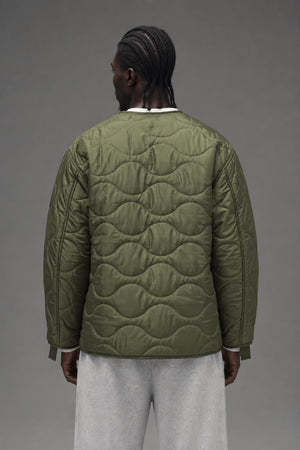 AI model photo - Rothco M-65 Field Jacket Liner Olive Drab 8292
