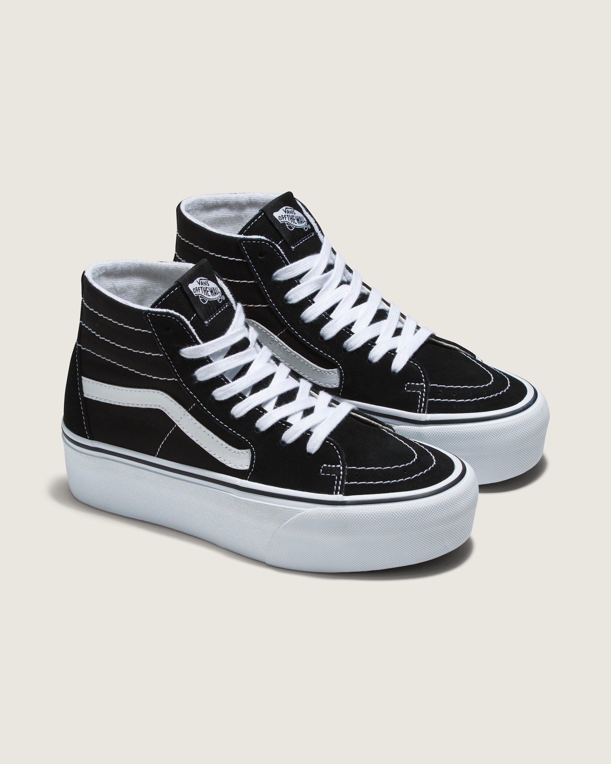 Angled pair of Black/True White Vans Sk8-Hi Tapered Platform high-top sneakers