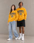 Tommy Hilfiger Men's Collegiate Logo Sweatshirt College Gold DM16804 710