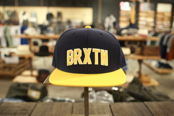 Brixton Hamilton Snap Back Navy/Gold 115 00299 0871.