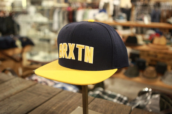 Brixton Hamilton Snap Back Navy/Gold 115 00299 0871.